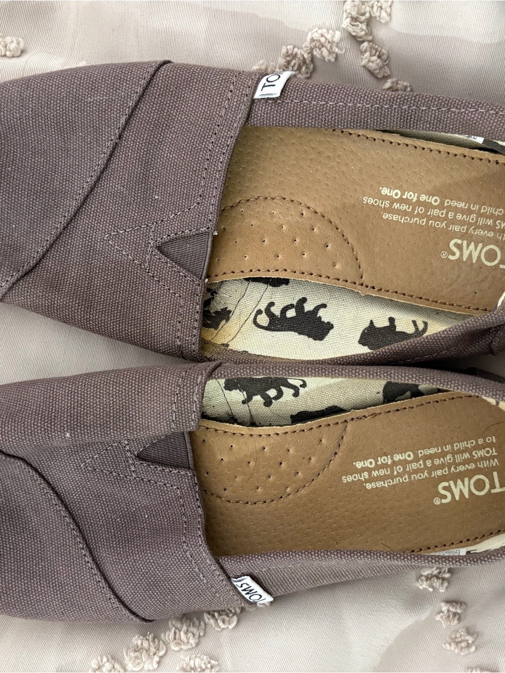 TOMS Slip-On Canvas Shoes in Brown with Elephant Print Lining